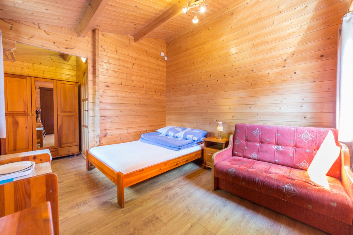 Pok&oacute;j w domku typu Bliźniak